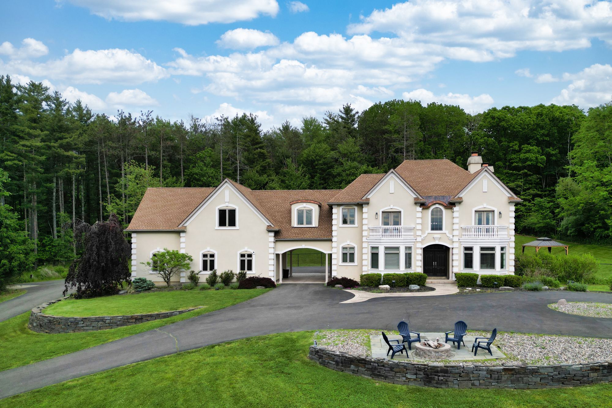Front elevation of the Main House with the fire-pit terrace