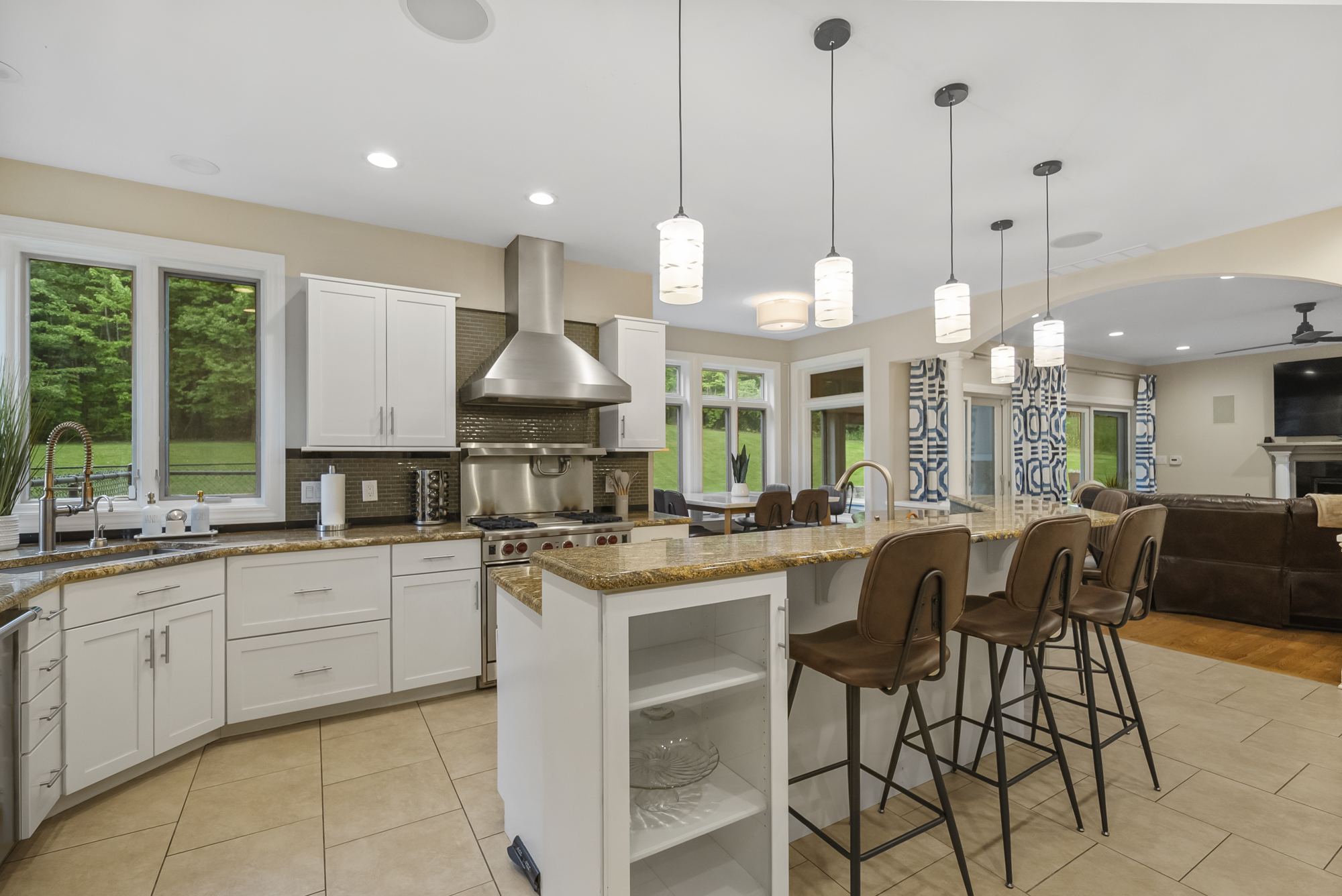 Chef's kitchen island with bar seating