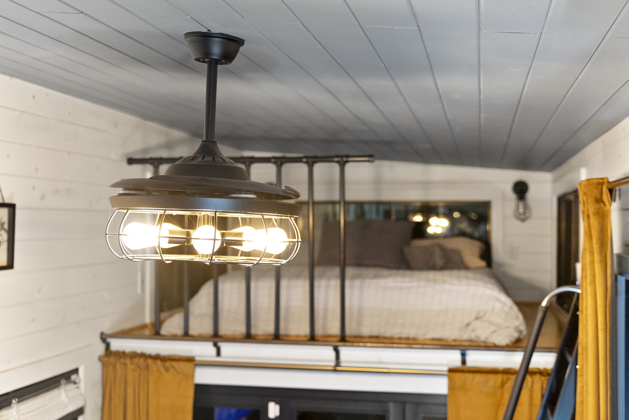 Cage pendant over the loft